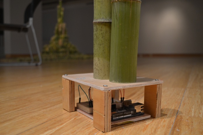An example of how the Arduino board will reside in the sculpture. Bamboo will rest on top of the housing I built, hiding the electrical components out of view.
